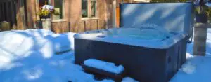 How do specially-designed covers help to protect your hot tub?