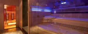 What are the health benefits of sitting in a sauna?