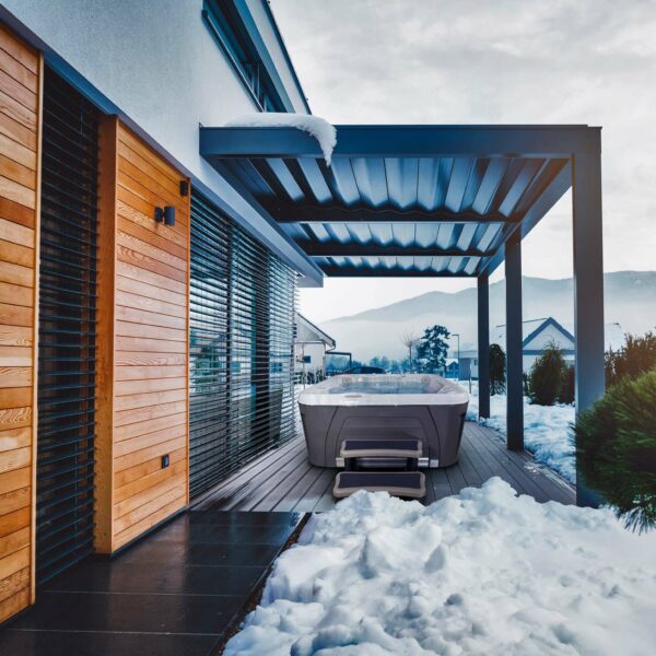 Hydropool 6600 serenity hot tub on decking in winter scenery
